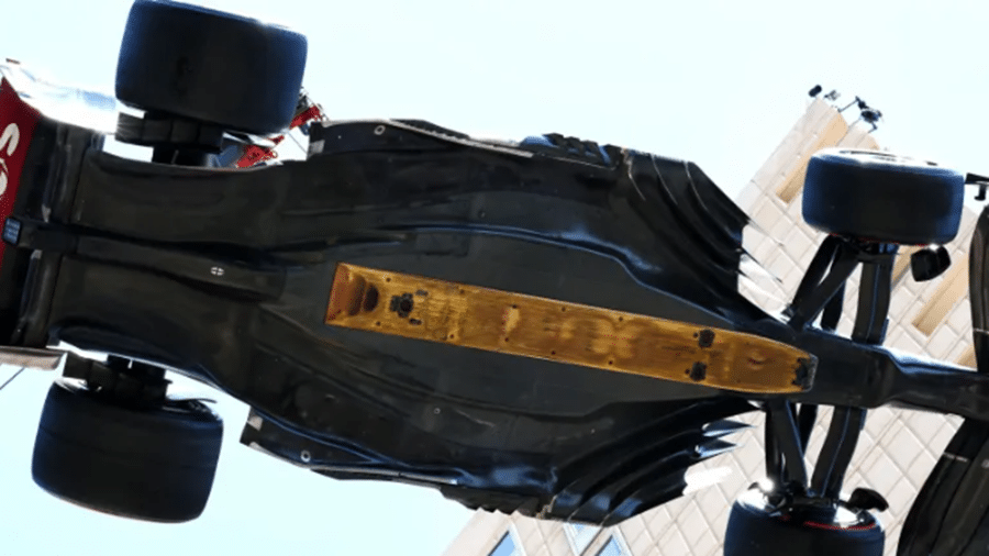 Underside of an F1 car showing the wooden skid plank